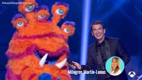 _____ Hosted by Nick Cannon, with panelists Ken Jeong, Jenny McCarthy, Nicole Scherzinger and Robin Thicke, “The Masked Singer’' is a top-secret singing competition in which celebrities face ... 